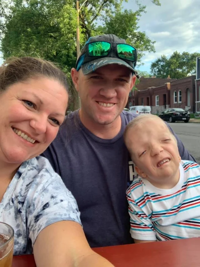 Grayson with his parents