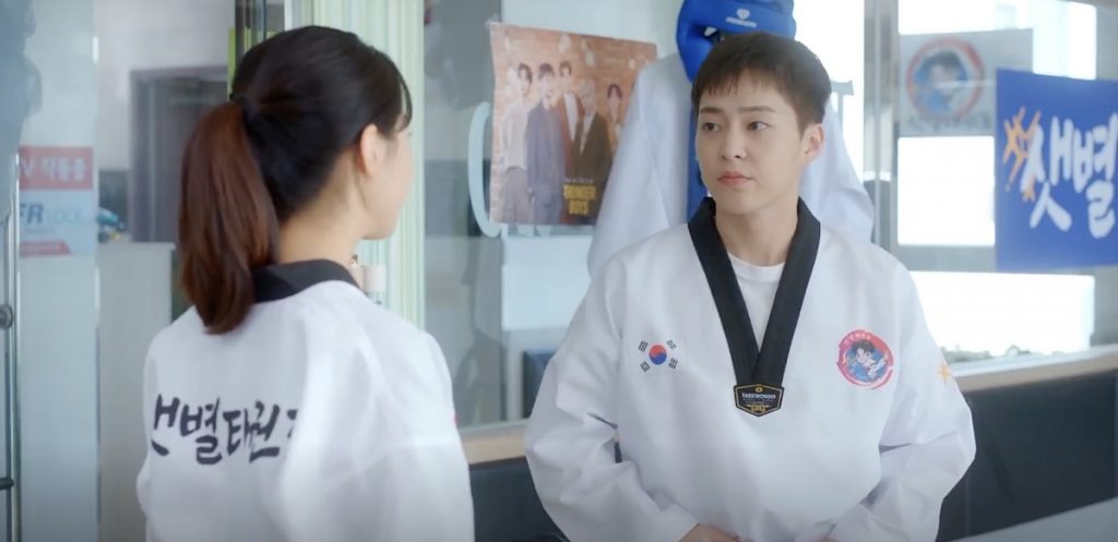 Shin Tae-ho (played by Kim Min-seok aka Xiumin) is at the taekwondo studio